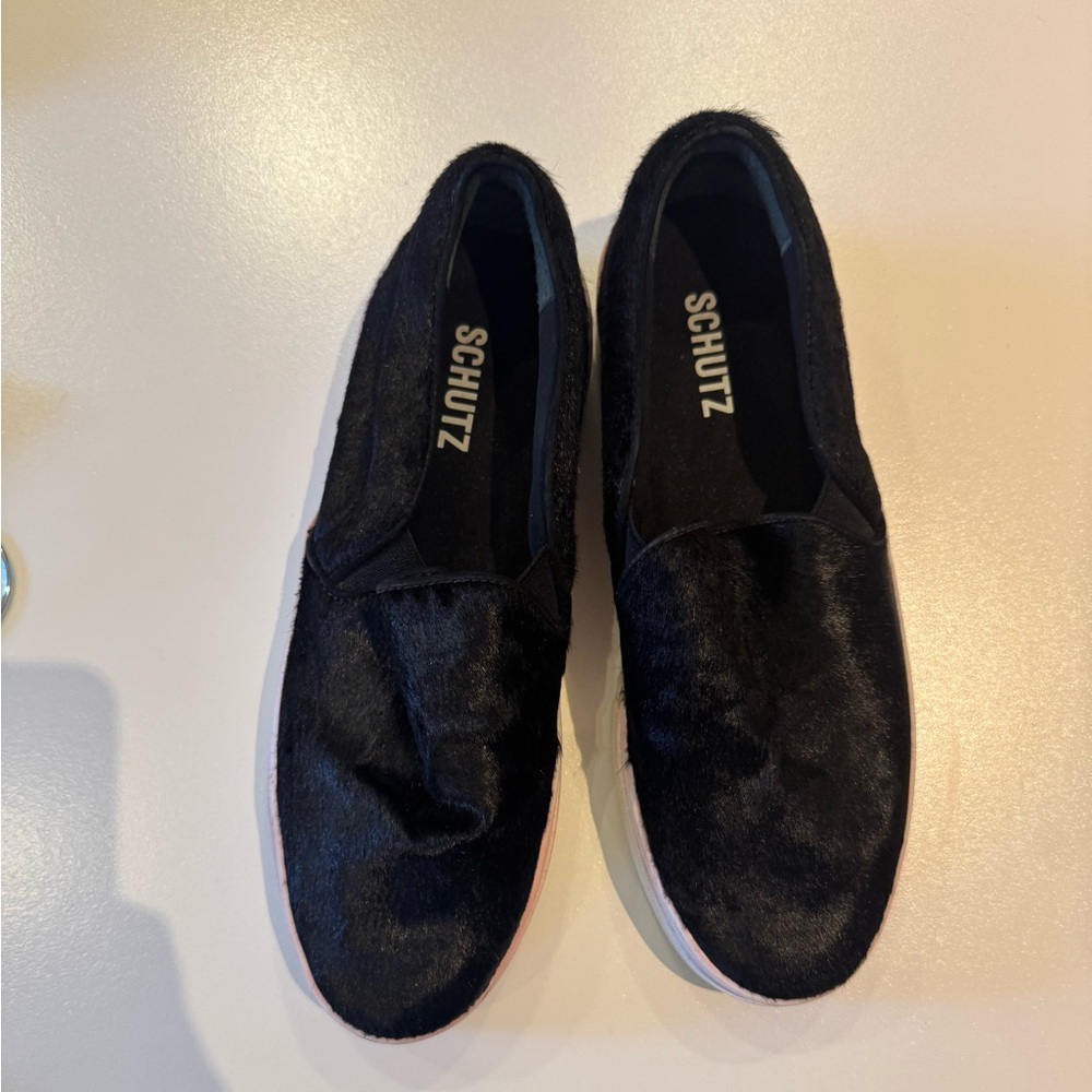 SCHUTZ Black cow hair Textured Slip-Ons